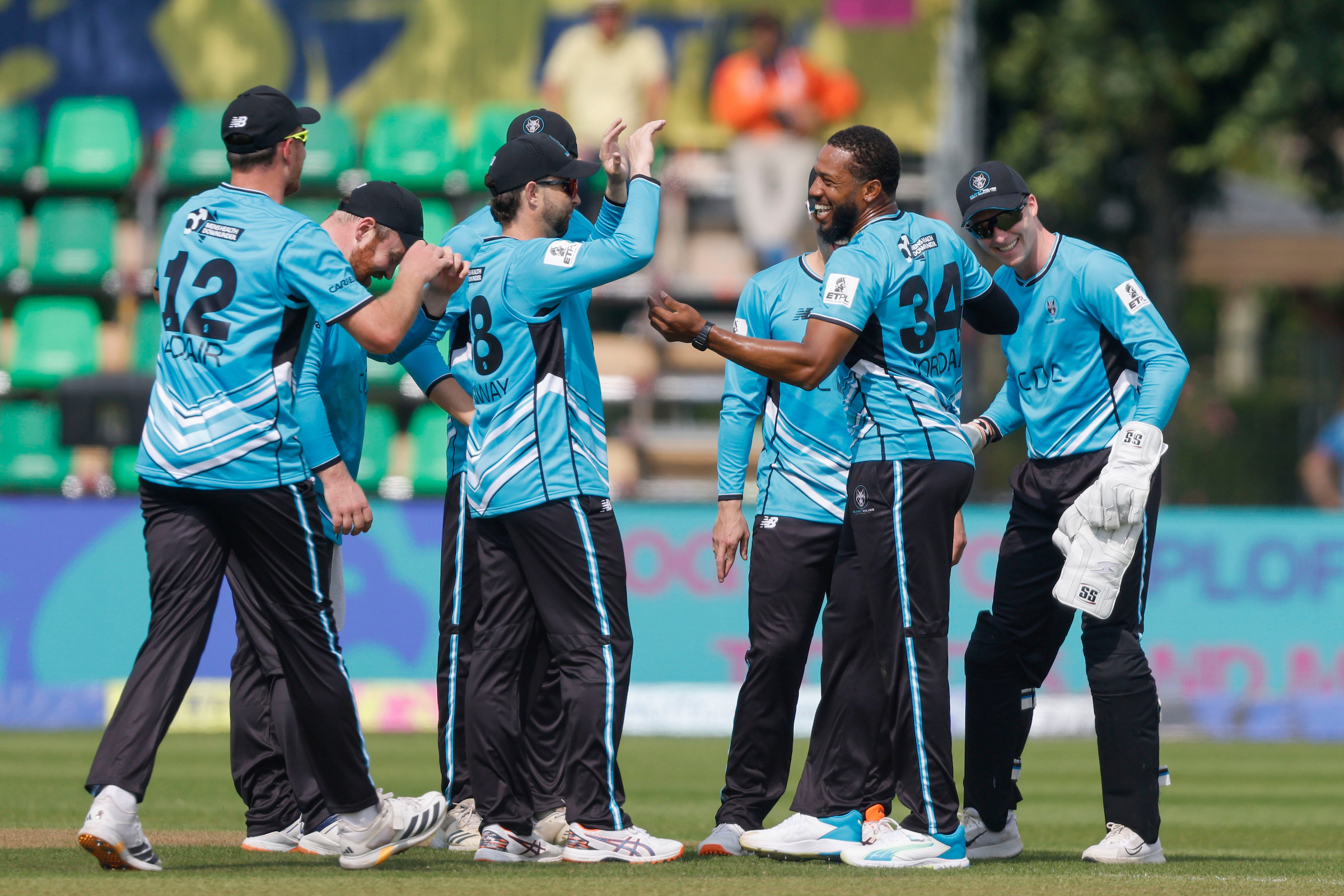 Chris Jordan of Belfast Wolves celebrates the wicket of Vijay Shankar of Dublin Guardians during Match 2.